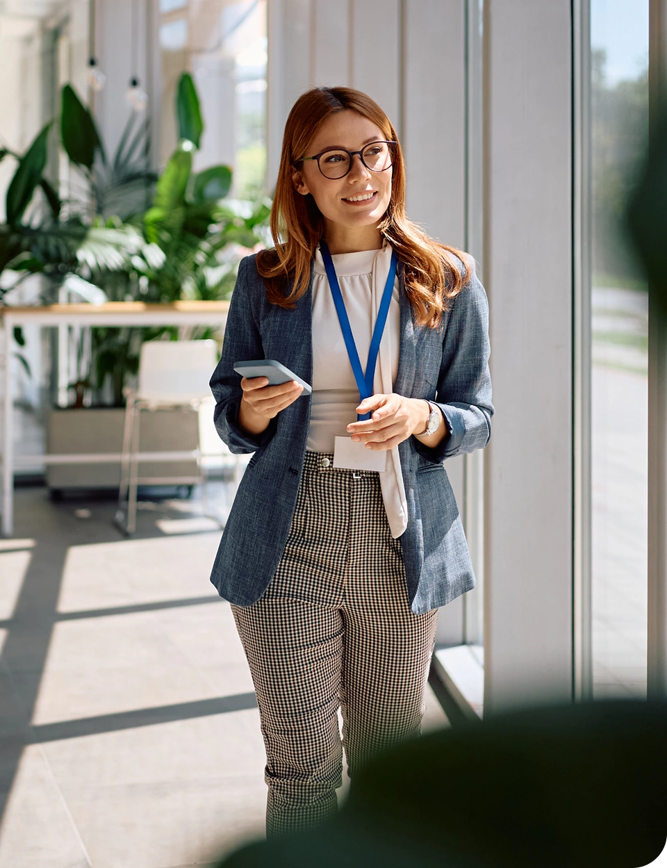 Employee smiling in a modern workplace